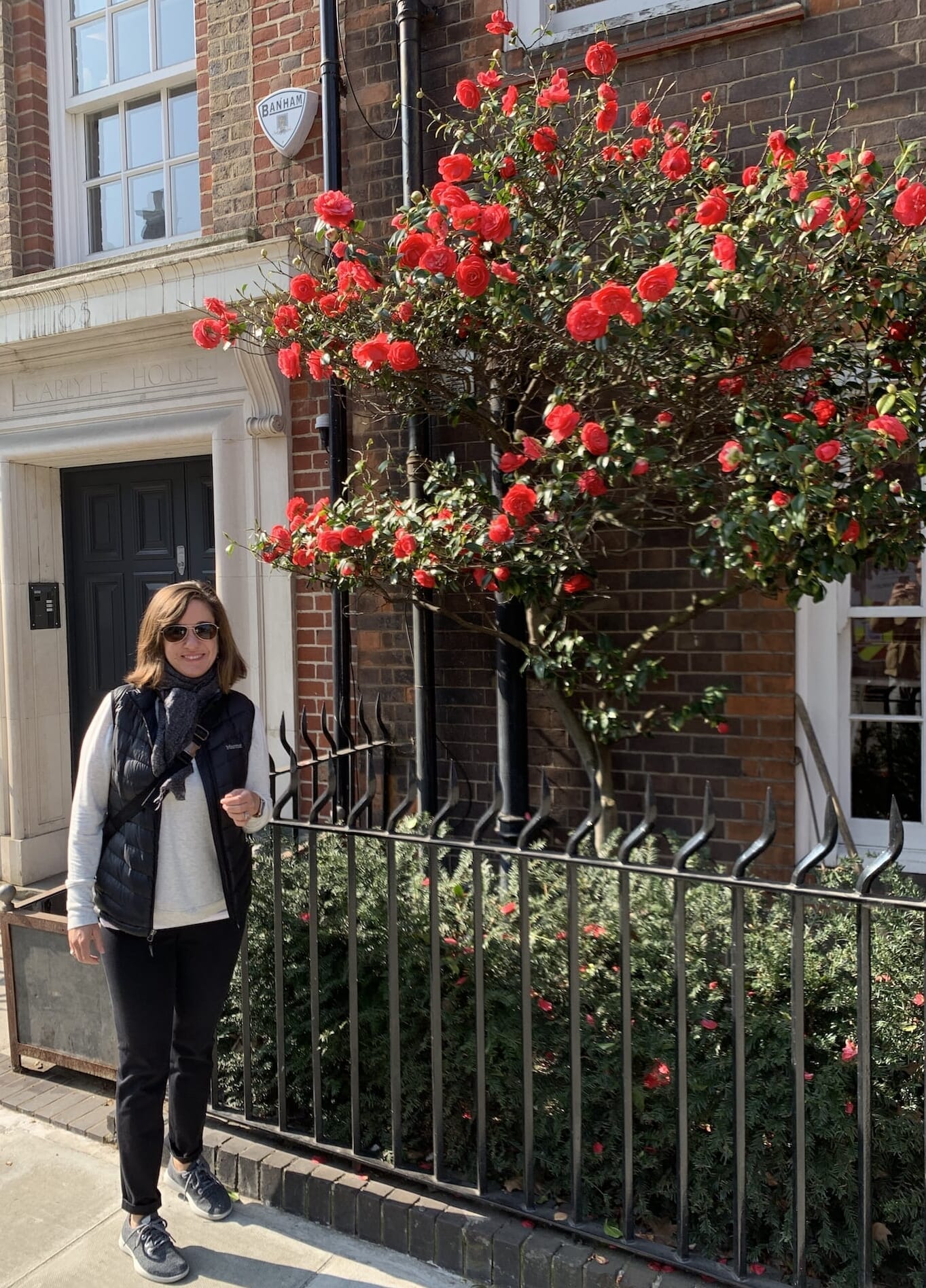 Katie admiring the neighborhood gardens in South Kensington, London