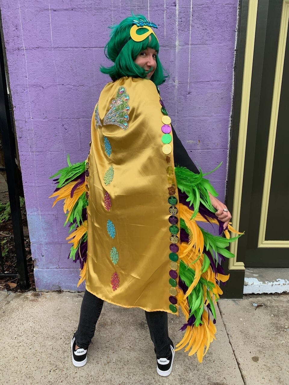 Katie getting ready for Mardi Gras day (costume parts sourced in NYC during our Westminster Dog Show tour)